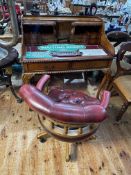 Mahogany Carlton House style desk on ball and claw legs and Captains style ox blood buttoned