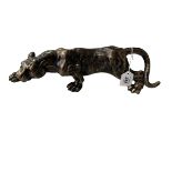 Bronzed finish metal lion, 41cm length.