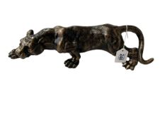 Bronzed finish metal lion, 41cm length.