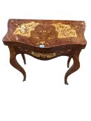 Continental inlaid fold top card table of serpentine form, 79cm by 79cm by 41cm.