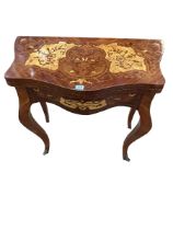 Continental inlaid fold top card table of serpentine form, 79cm by 79cm by 41cm.