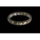 18 carat white gold diamond set wedding band ring, size M.