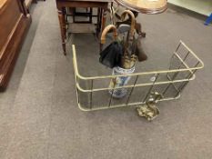 Brass and wirework fender, brass door stop, ceramic stick stand and contents.