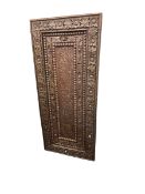 Rectangular Islamic carved panel, 155cm by 68.5cm.