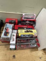 Fifteen boxed models including Britains 1:32 Kane Low Loader and Massey Ferguson 6600 Tractor,