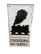 Cast metal 'Crossing No Gates' sign.