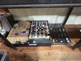 Two boxes of Yesteryears model vehicles and display case.