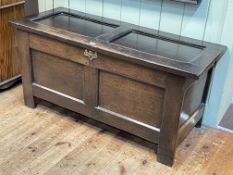 Antique oak double panel front coffer, 57.5cm by 122cm by 49.5cm.