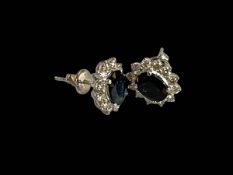 Pair of 18 carat white gold, sapphire and diamond cluster earrings, sapphire 3.