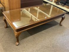 Chippendale style rectangular low centre table on cabriole legs, 42cm by 138cm by 67cm.