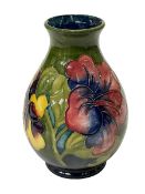 Vintage Moorcroft Pottery anemone vase with warrant label, 19.5cm.