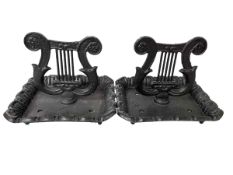 Pair of cast metal boot scrapers.