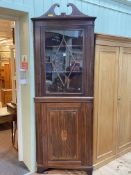 Edwardian inlaid mahogany standing corner cabinet having astragal glazed door above an inlaid panel