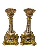 Pair of Royal Crown Derby Imari 1128 pattern candlesticks, 27cm.