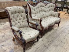 Victorian mahogany framed arched back settee in buttoned foliate pattern fabric together with a