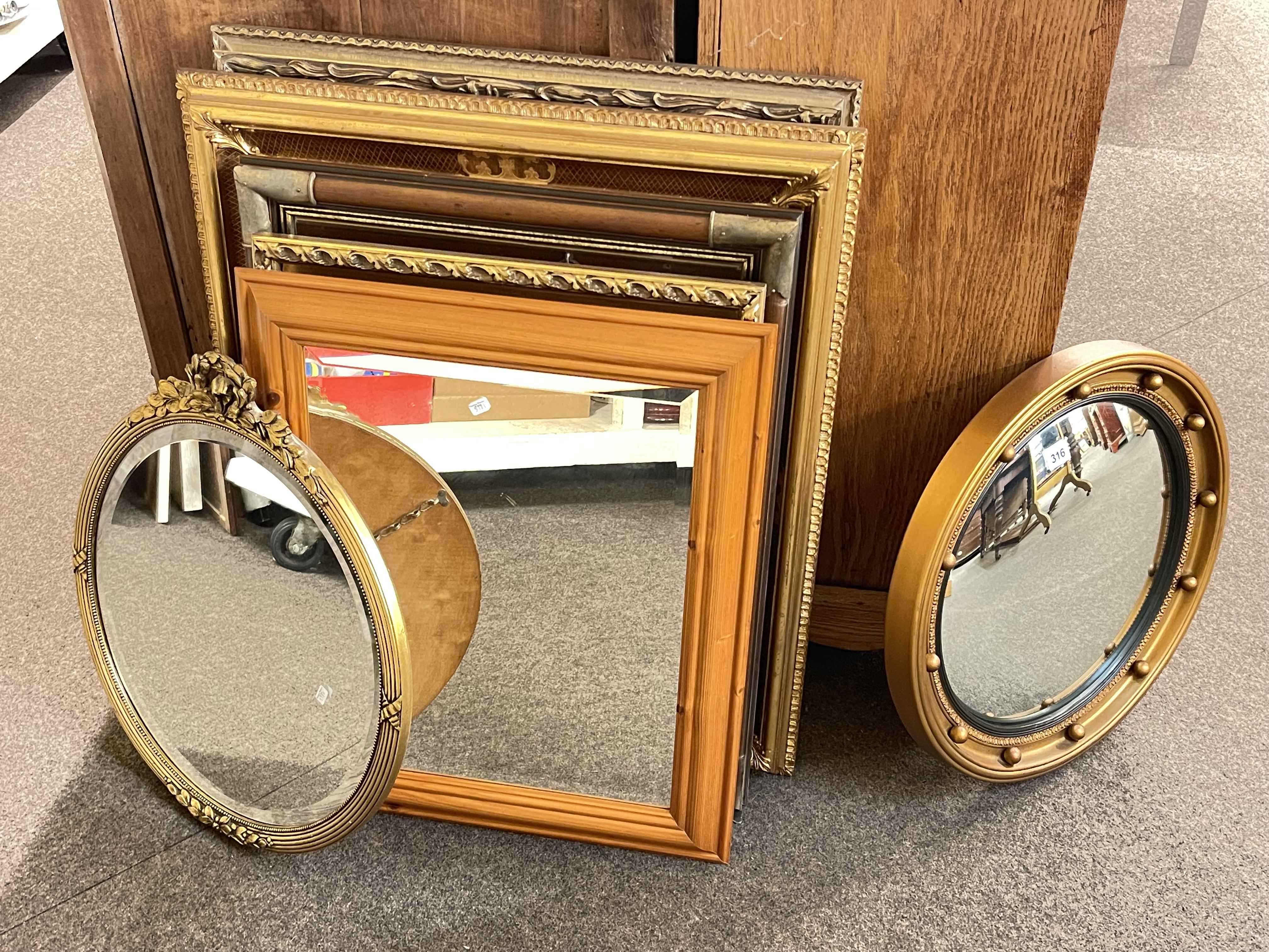 Collection of seven various wall mirrors including convex, bevelled, etc,