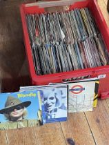 Box of single records including Pop.