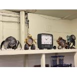 Five novelty clocks.