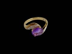 Amethyst and diamond 9 carat gold ring, size L.
