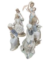 Five Lladro and two Nao figures.