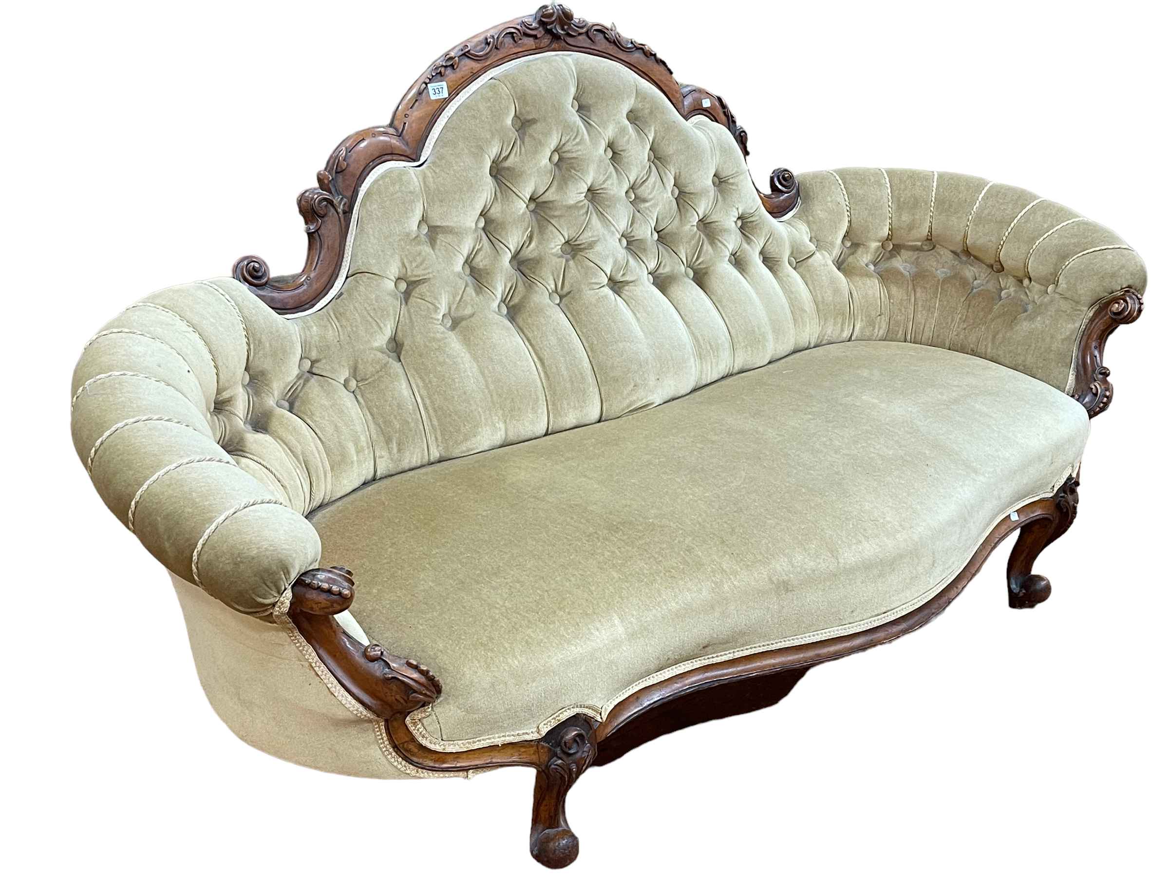 Victorian walnut framed arched back settee with serpentine front seat in buttoned draylon.