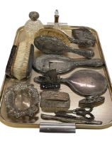Silver backed brushes and mirrors, silver topped toilet jars, pierced bon bon dish, etc.