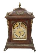 Oak and brass mounted mantel clock with brass and silvered dial, 42cm.