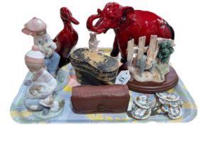 Royal Doulton Flambé elephant and duck, two Lladro figures, two Beatrix Potter groups,