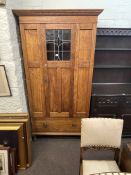1920's oak wardrobe with leaded glass panel door, 194cm by 100.5cm by 50cm.