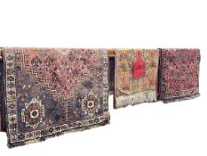 Three various Eastern design rugs, largest 2.00 by 1.36.