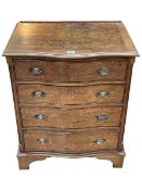 Burr walnut serpentine front chest of four long drawers on bracket feet, 75.5cm by 60.5cm by 43.5cm.