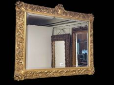 Rectangular gilt framed bevelled wall mirror, 68cm by 85cm.