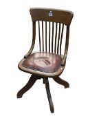 Early 20th Century oak swivel office chair.