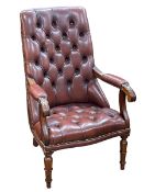 Brown buttoned leather and brass studded open armchair.