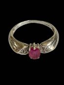 Ruby and diamond 9 carat white gold ring, size P.