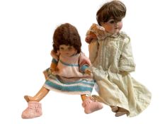 German bisque head doll and later doll.