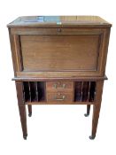 Good Edwardian mahogany and line inlaid secretaire having hinged lid and fall front enclosing a