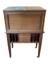 Good Edwardian mahogany and line inlaid secretaire having hinged lid and fall front enclosing a