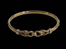 9 carat gold bangle.