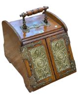 Late Victorian/Edwardian walnut and brass mounted coal box with patent door opening mechanism.