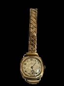 Ladies gold wristwatch.