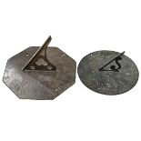 Two bronze sundials.