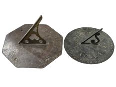 Two bronze sundials.