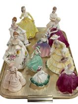 Eight Coalport and three Royal Doulton figurines (11).