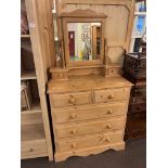 Pine seven drawer dressing chest, 170cm by 91cm by 44cm.