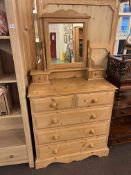 Pine seven drawer dressing chest, 170cm by 91cm by 44cm.