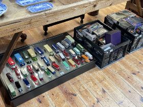 Collection of Diecast models, majority buses, and a display case.