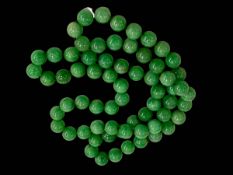 Green Jade bead necklace.