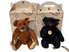 Two Steiff Classic teddy bears, beige and black, both with boxes.