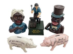 Five novelty money boxes.